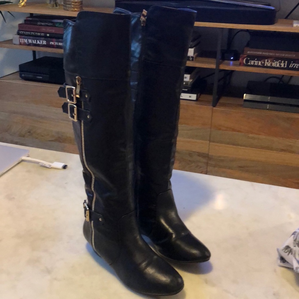 Black over the knee boots with side zippers